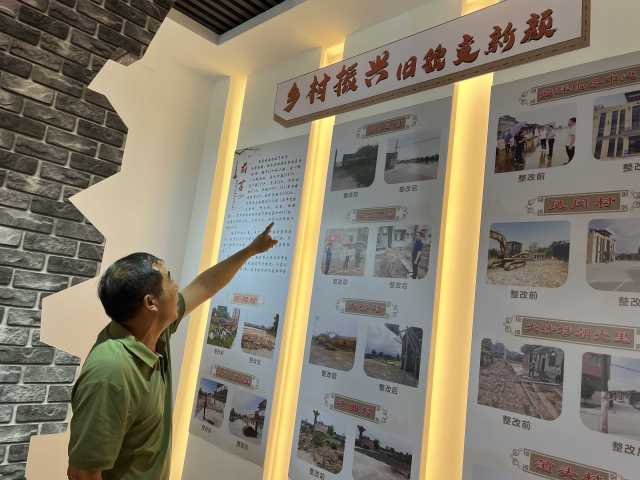 平原村書記吳振述向記者講述村子蝶變的經(jīng)過。伍思懿 攝 